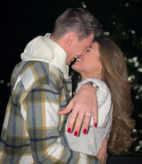 Christian Fassnacht with his fiance Jennifer Aline after she said yes